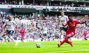 Balotelli misfires but liverpool win at Spurs
