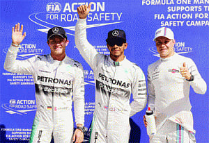 Hamilton breaks Rosberg's hold, takes pole for Italian GP