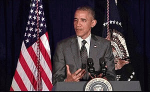 Obama defends decision to delay immigration action