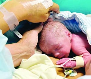 Woman has baby after womb transplant in world first