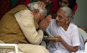 Modi turns 64; meets mother to seek blessings