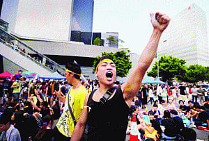 Quit or we occupy buildings: HK protesters