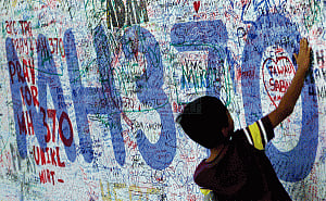 Families furious over report MH370 to be declared 'lost'