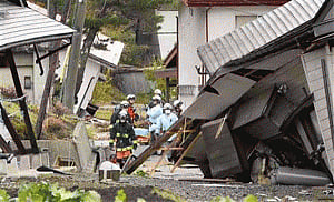 Japan earthquake collapses homes, causes injuries