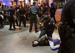 Protesters return to riot-scarred Ferguson streets