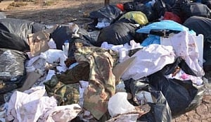 CRPF orders inquiry into blood-stained uniforms found in dump