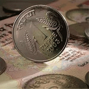 Rupee falls to over 1-week low vs USD, down 14 p at 62.02