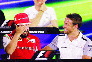 Mclaren sign Alonso to drive with Button in 2015
