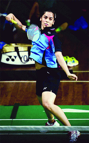 Saina, Srikanth march forward