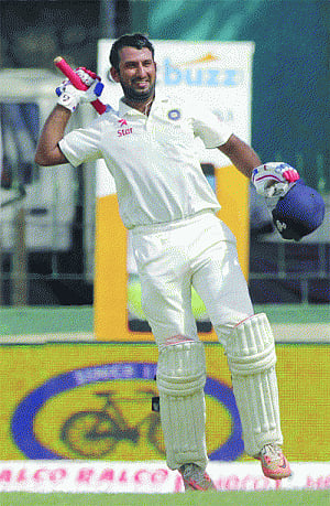 Pujara ton helps India claw back