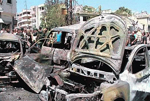Syria car bombs kill 26 :monitor