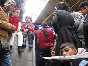 Migrants' long and winding road to Europe turns cold, muddy