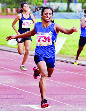 dutee completes treble