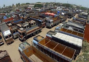 Truckers proceed on a nationwide strike against toll system