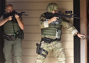Obama blasts US lawmakers after another mass shooting leaves 10 dead