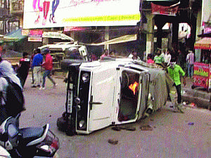 Curfew clamped briefly  on Varanasi as sadhus' protest turns violent
