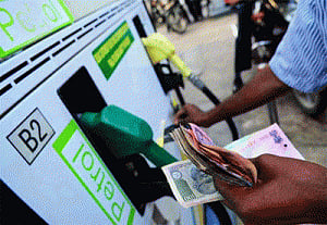 Petrol price cut by 50 paise a litre