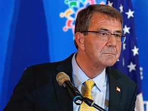 US defence secretary visits carrier in disputed waterway