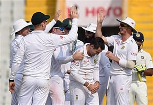 Elgar four-for helps SA take honour on Day One