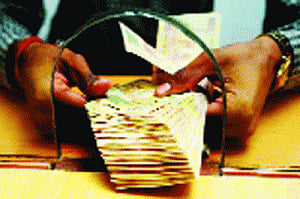 Government looks at more taxes, dividends to meet deficit target
