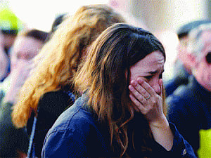 Paris butcher named, AKs found in 'getaway' car