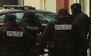Police mount raid to hunt ninth Paris attacker