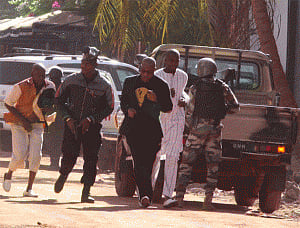 Gunmen hold 170 hostage at Mali hotel, three killed