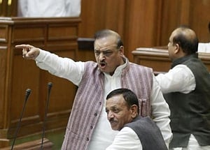 AAP workers hold protest outside BJP MlA's house