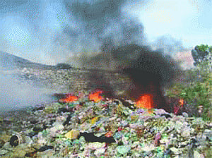 Once again burning of waste in open takes centre stage