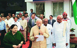 PM surveys mayhem, pledges Rs1K cr more
