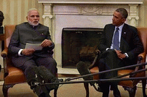 Obama telephones Modi, committed to strong climate change pact