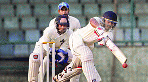 Delhi crush Tripura, inch closer to QF