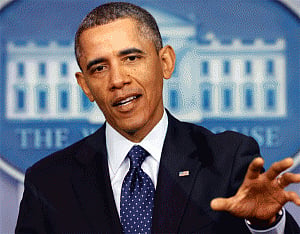 Obama signs Omnibus spending bill into law;raises H1B visa fee