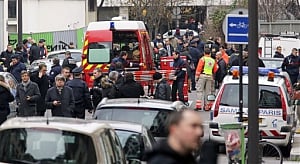 Police woman injured in France shooting dies