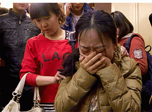 Chinese MH370 relatives reject word that passengers are dead