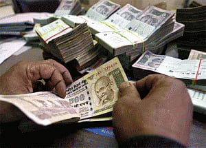 Rupee up 15 paise against dollar in early trade