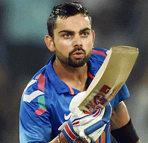 Kohli ton powers India to 300/7 against Pakistan