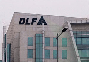 DlF to sell 50% stakes in 4 projs to PE firms for Rs 3,000 cr