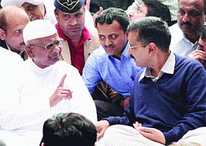 Shishya Arvind invites 'Guru Anna' to bless his new office