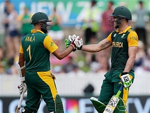Amla, Du Plessis hit tons in SA's run feast