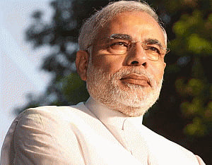 PM arrives in MP to inaugurate power units, greets CM on b'day