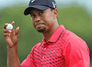 Woods plays golf with Yao Ming