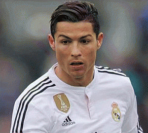 Ronaldo hat-trick keeps title race alive