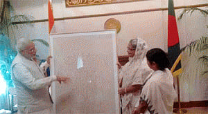 Modi gifts hand-woven tapestry to Hasina