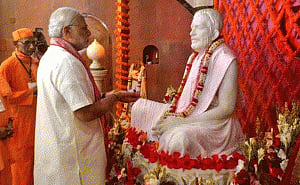 Modi visits temple, Indian chancery in Dhaka