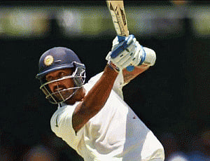 Vijay's 150 brightens rain-hit day, India 462/6 at close