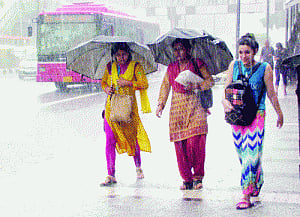 Rain showers respite from heat, misery to commuters