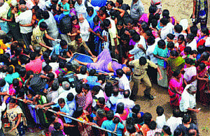 27 die as thousands jostle for holy dip