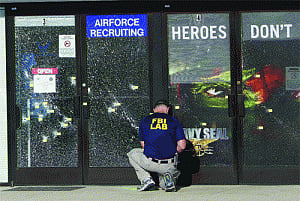 FBI probe on as gunman kills four US Marines