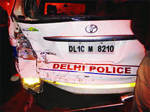 Five hurt in cars-motorbikes-police van collision